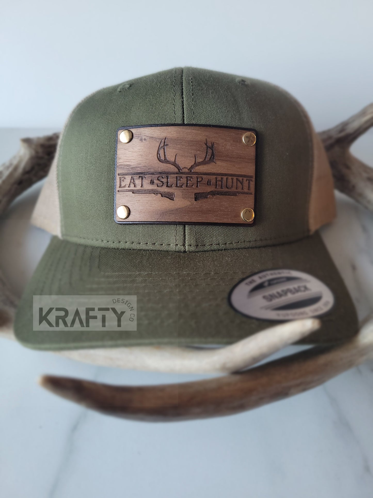 Eat Sleep Hunt premium walnut and leather patch trucker hat