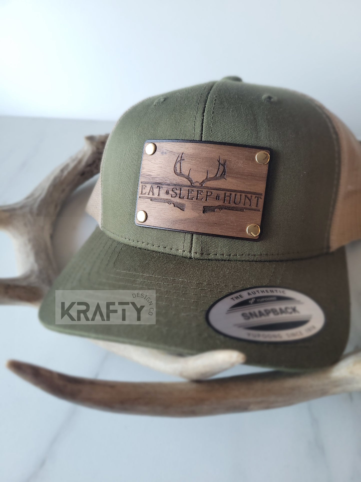 Eat Sleep Hunt premium walnut and leather patch trucker hat