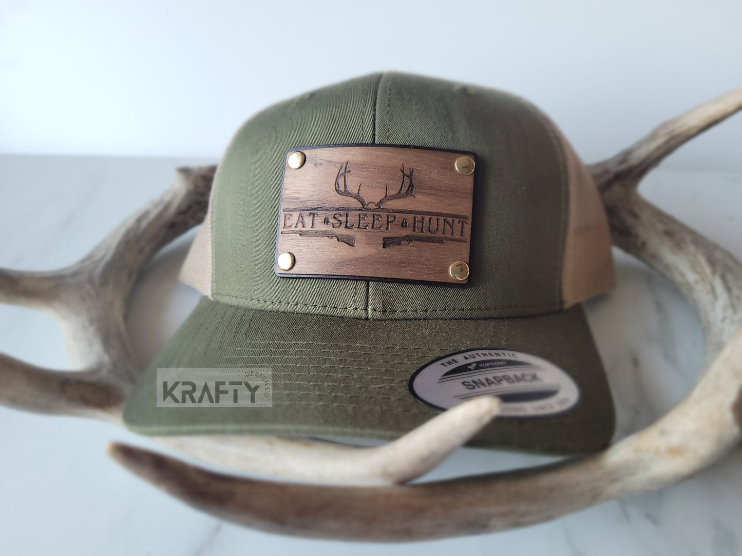 Eat Sleep Hunt premium walnut and leather patch trucker hat
