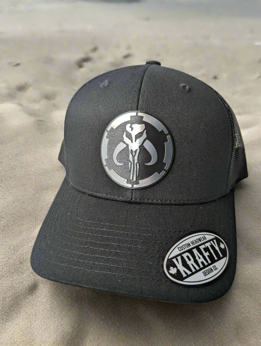 Mythosaur brushed stainless patch trucker hat