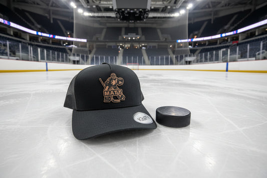 a black trucker hat featuring a rawhide patch featuring a hockey goalie and custom name MATT across the design