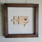 Puzzle piece framed sign