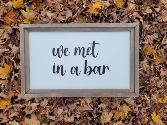 We met in a bar sign