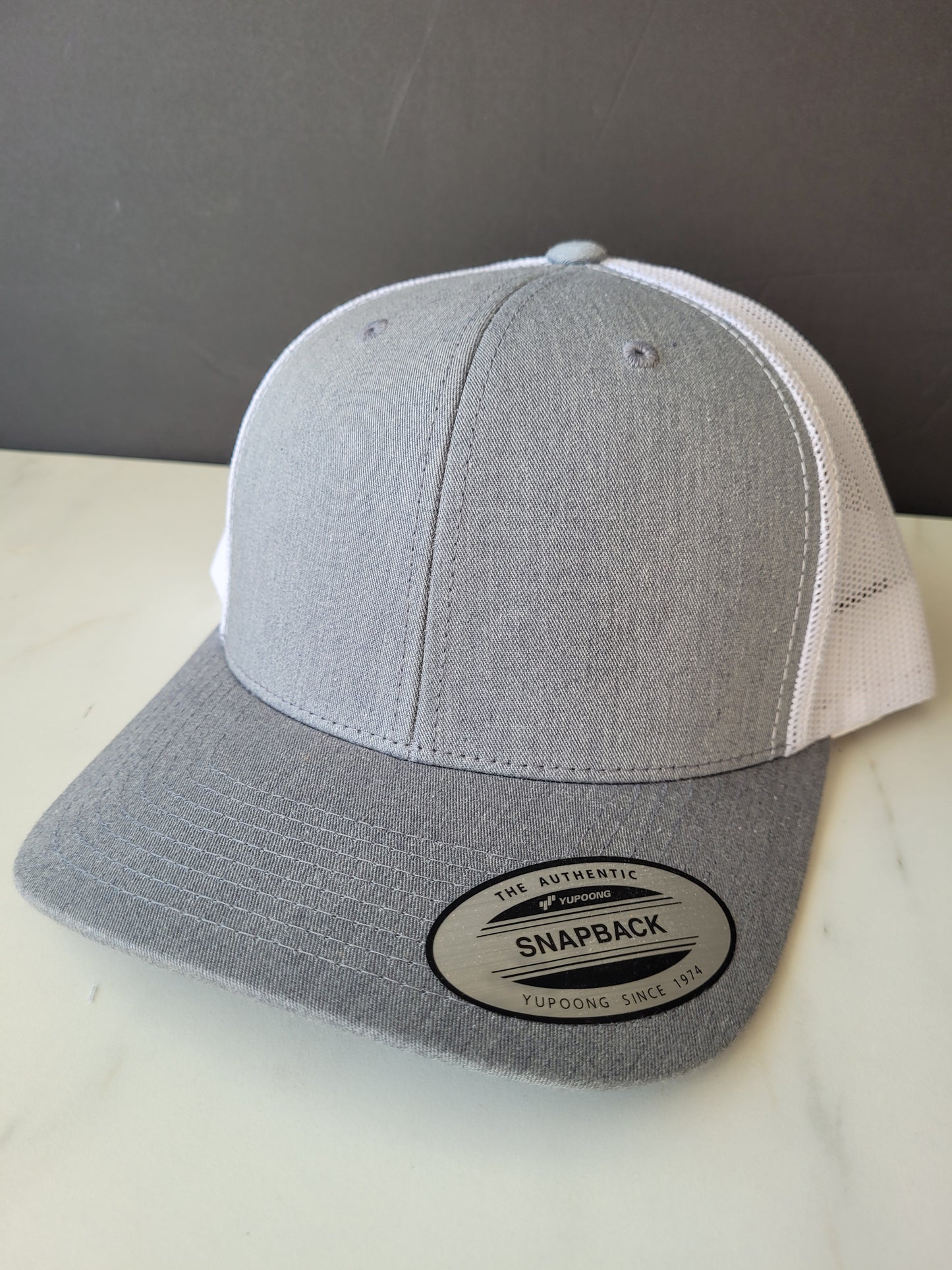 Light grey/white snapback hat